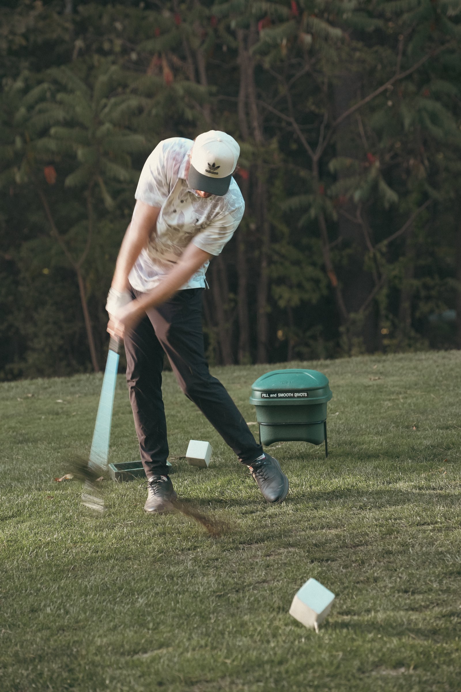 Cory golfing at golden hour.